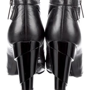 Chanel CC quilted leather boots